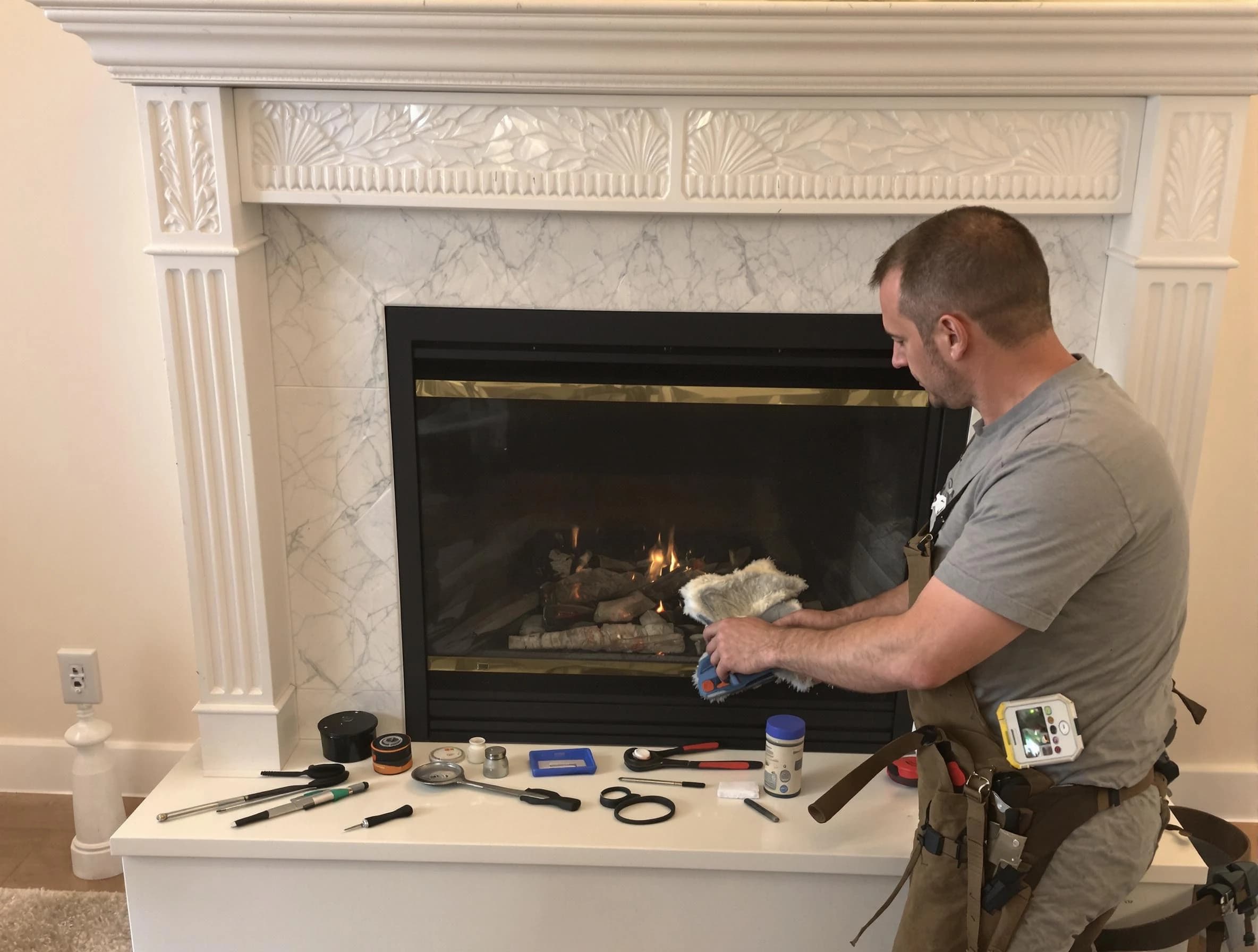 Melrose Chimney Sweep performing fireplace maintenance in Melrose, MA