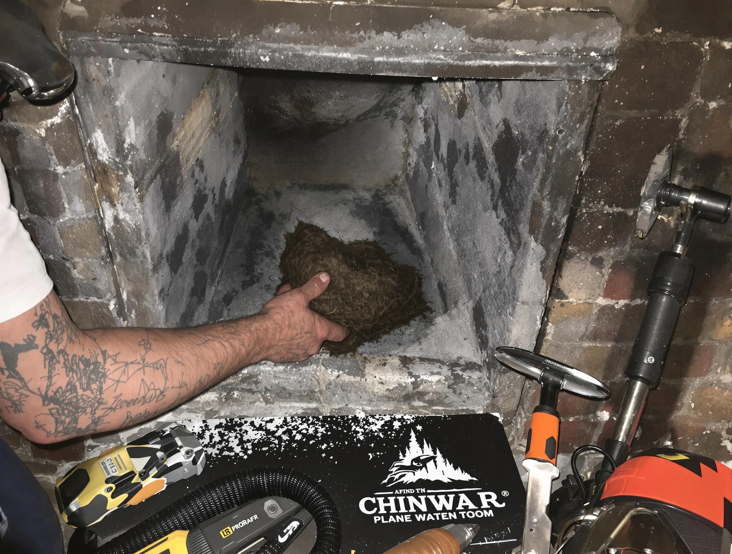 Melrose Chimney Sweep safely removing debris and screening chimney in Melrose, MA